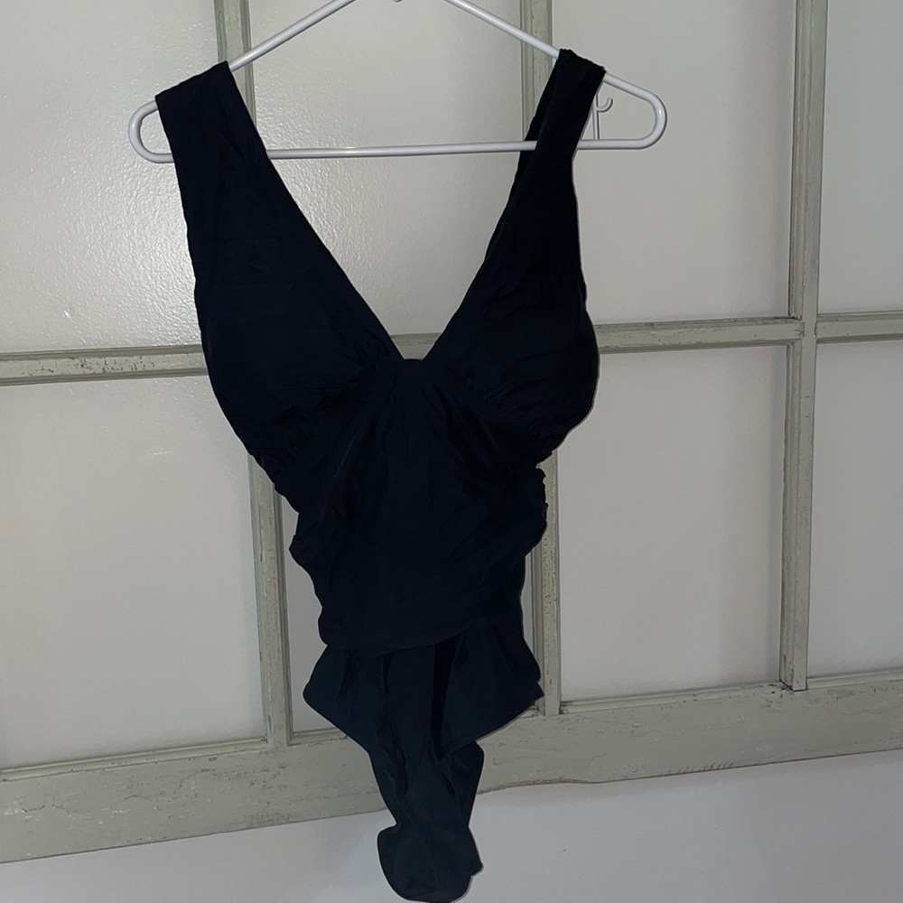 Black one piece swim suit.
